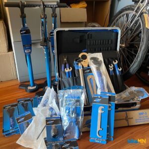 A box of Park Tool bike repair tools and pumps sits on the floor of BikeMN's headquarters in Minneapolis.