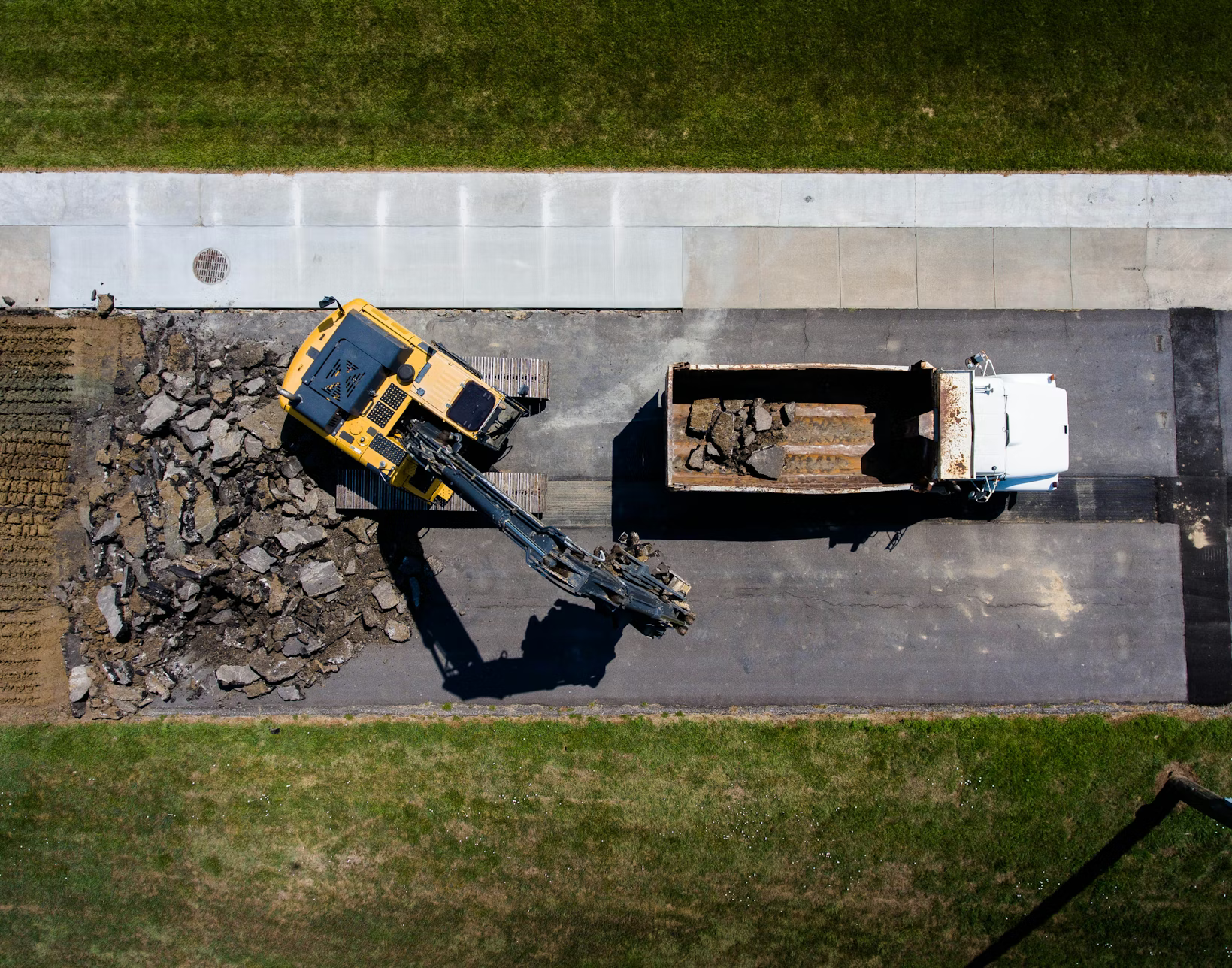 photo of road construction equipment from above