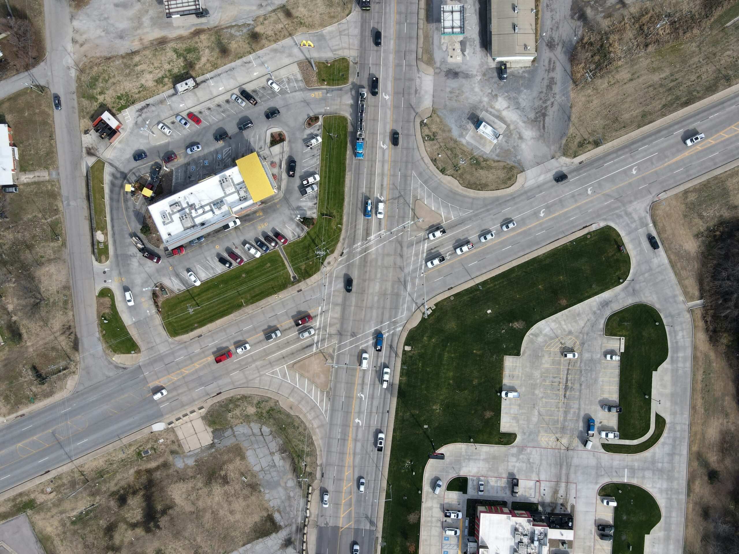 Photo of a wide and dangerous intersection taken from above.